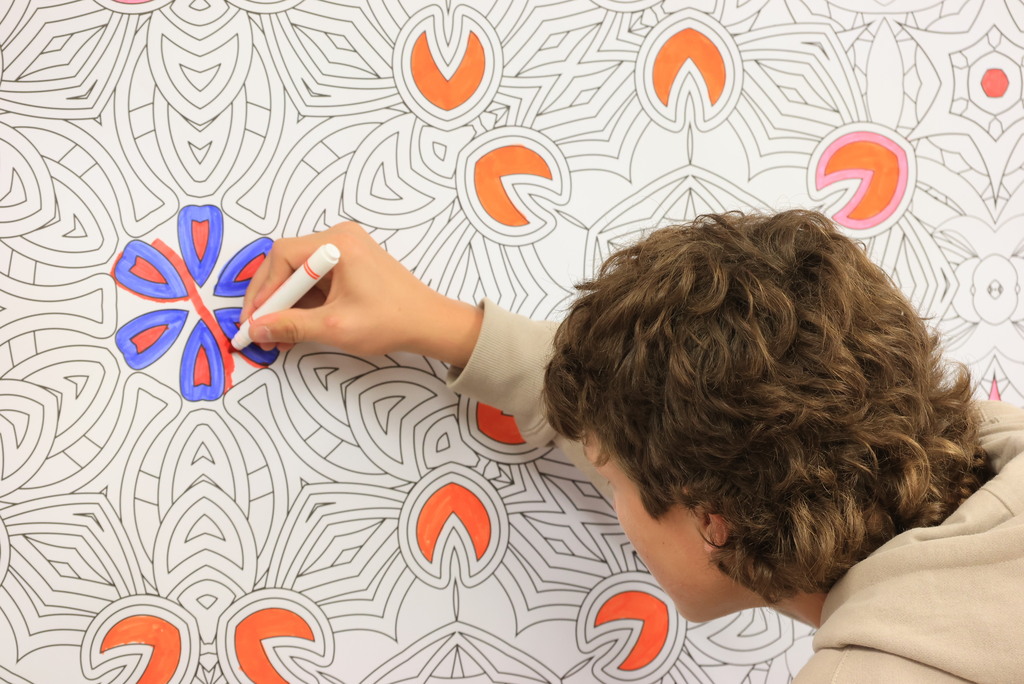 Ms. TenClay's World History students create their own art while learning about the differences between the two.