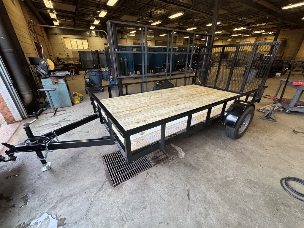 Students in Mr. Craig’s Ag Power class have completed a utility trailer project this week for Mr. Greg Sherbert. Mr. Sherbert provided all the necessary materials to build the 7x12 utility trailer. Students squared, leveled, and welded the frame and supports before powder-coating the trailer. After painting, students wired it for lights and brakes.