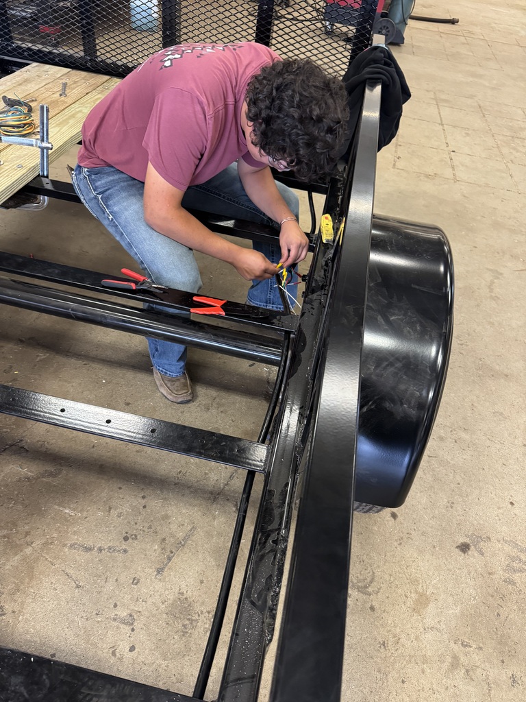 Students in Mr. Craig’s Ag Power class have completed a utility trailer project this week for Mr. Greg Sherbert. Mr. Sherbert provided all the necessary materials to build the 7x12 utility trailer. Students squared, leveled, and welded the frame and supports before powder-coating the trailer. After painting, students wired it for lights and brakes.