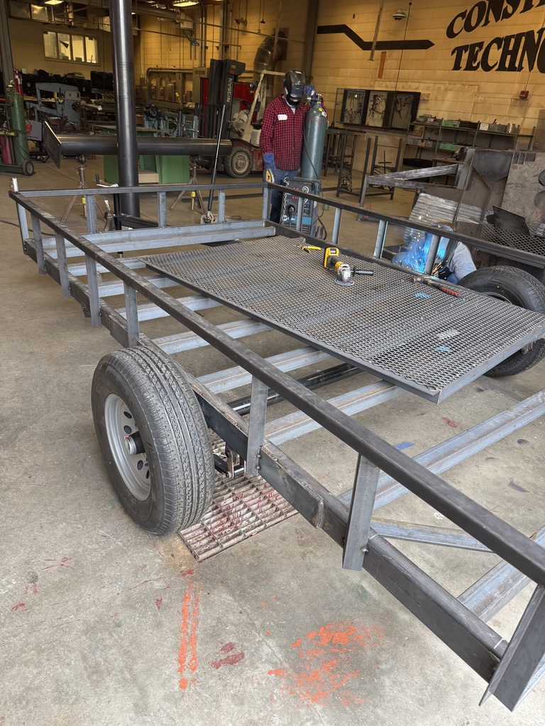 Students in Mr. Craig’s Ag Power class have completed a utility trailer project this week for Mr. Greg Sherbert. Mr. Sherbert provided all the necessary materials to build the 7x12 utility trailer. Students squared, leveled, and welded the frame and supports before powder-coating the trailer. After painting, students wired it for lights and brakes.