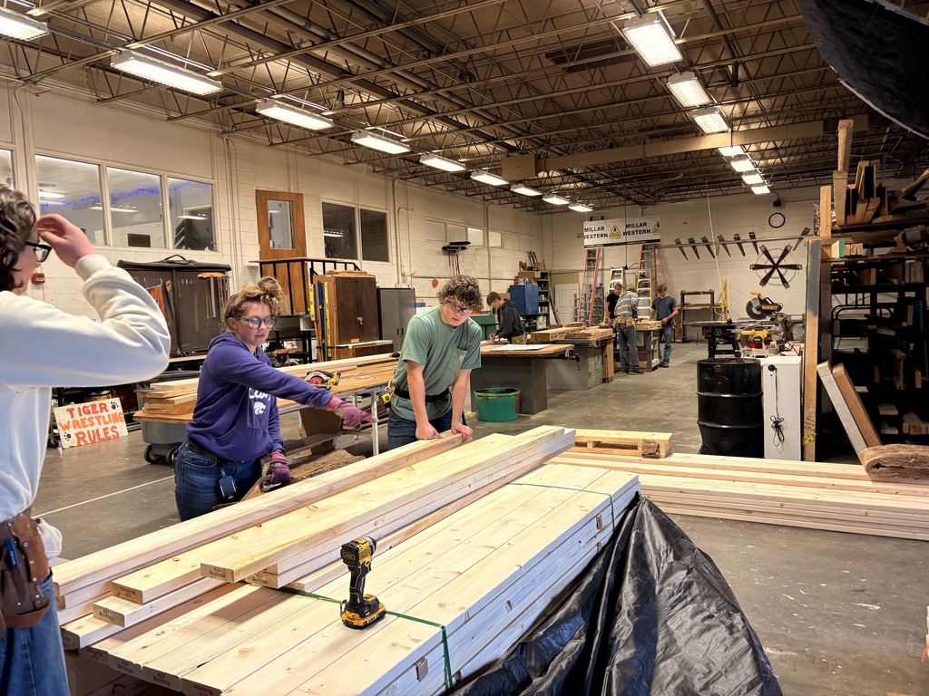 CCCHS construction technology students make headers and partitions and marking studs on the bottom and top plates. in the shop.