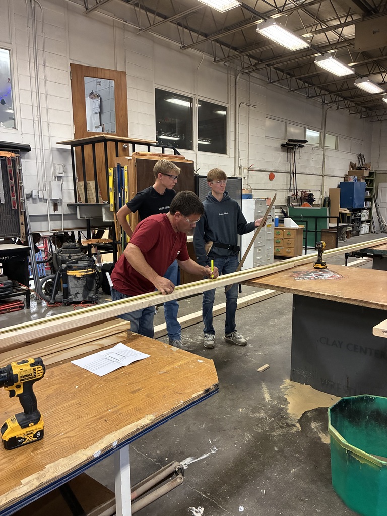 CCCHS construction technology students make headers and partitions and marking studs on the bottom and top plates. in the shop.