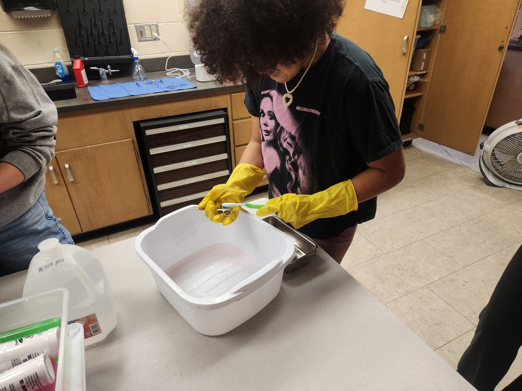 Mrs. Flegler's Animal Care students cleaned surgical tools that were simulated to have contaminants and dried blood. Taking it a step further, they prepared and wrapped surgical packs according to a provided surgical pack recipe.