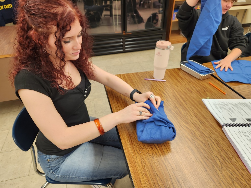 Mrs. Flegler's Animal Care students cleaned surgical tools that were simulated to have contaminants and dried blood. Taking it a step further, they prepared and wrapped surgical packs according to a provided surgical pack recipe.