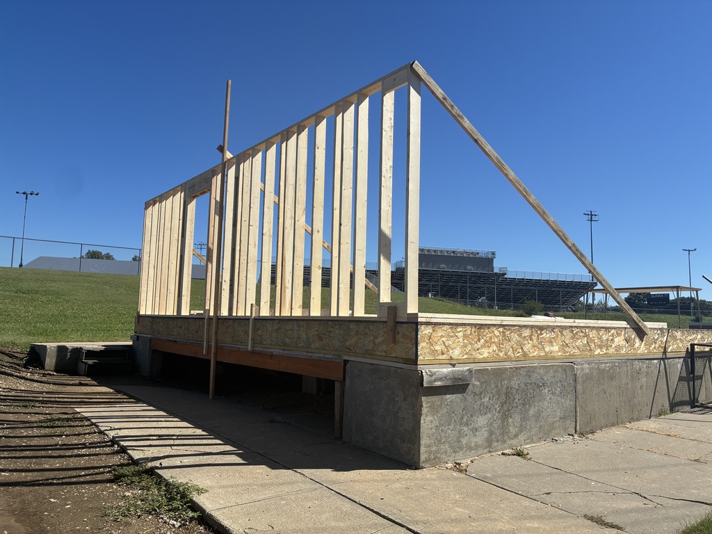 Construction tech students assemble and install the north wall of the Tiger House.