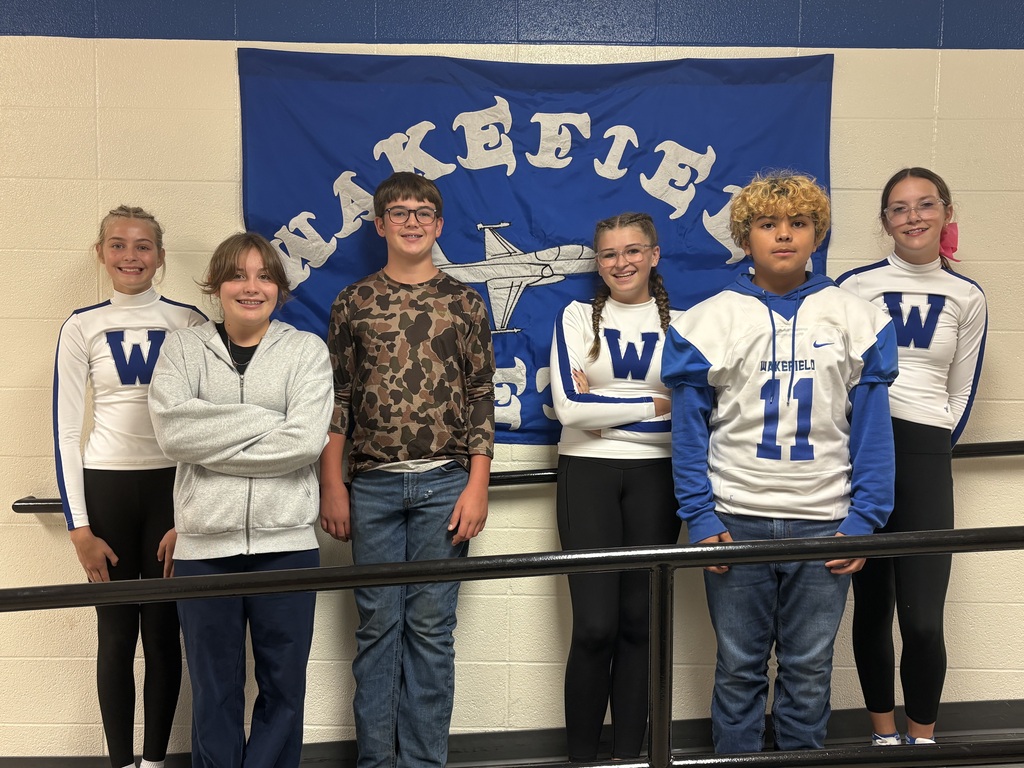 This is a photo of Wakefield Middle School students who were selected to participate in the North Central KMEA middle-level honor choir and honor band. The choir includes Payton Gray (soprano), Macie Nix (alto), and Hailey Smith (alto). The band includes Aubrey DeMaroney (flute), Macie Nix (trumpet), and Carlos Romero (baritone). The concert is at JCHS on November 7th at 2:30 pm.