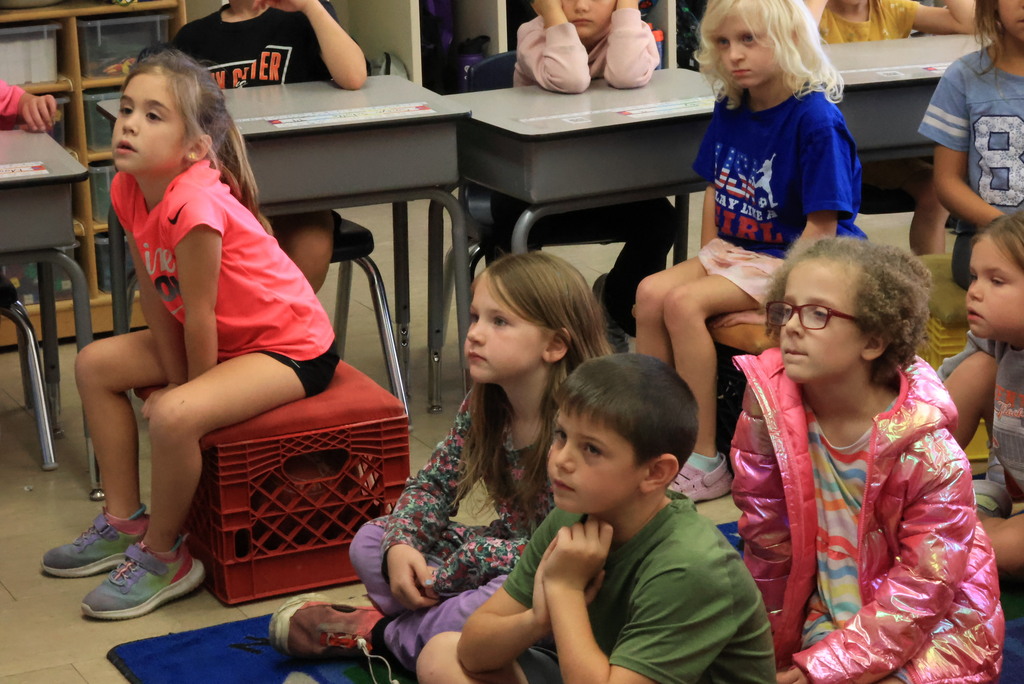 Clay Center Rotary members read "Josh, the Baby Otter" while promoting water safety.