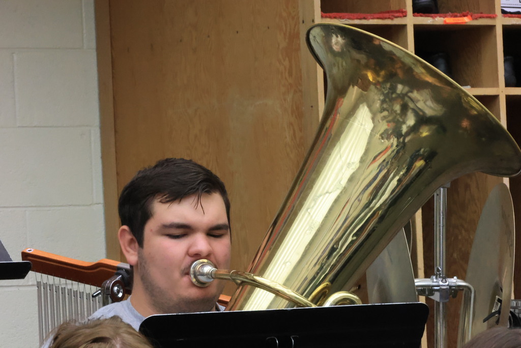 Mrs. Thrasher's band students practice their music for their marching band performance.
