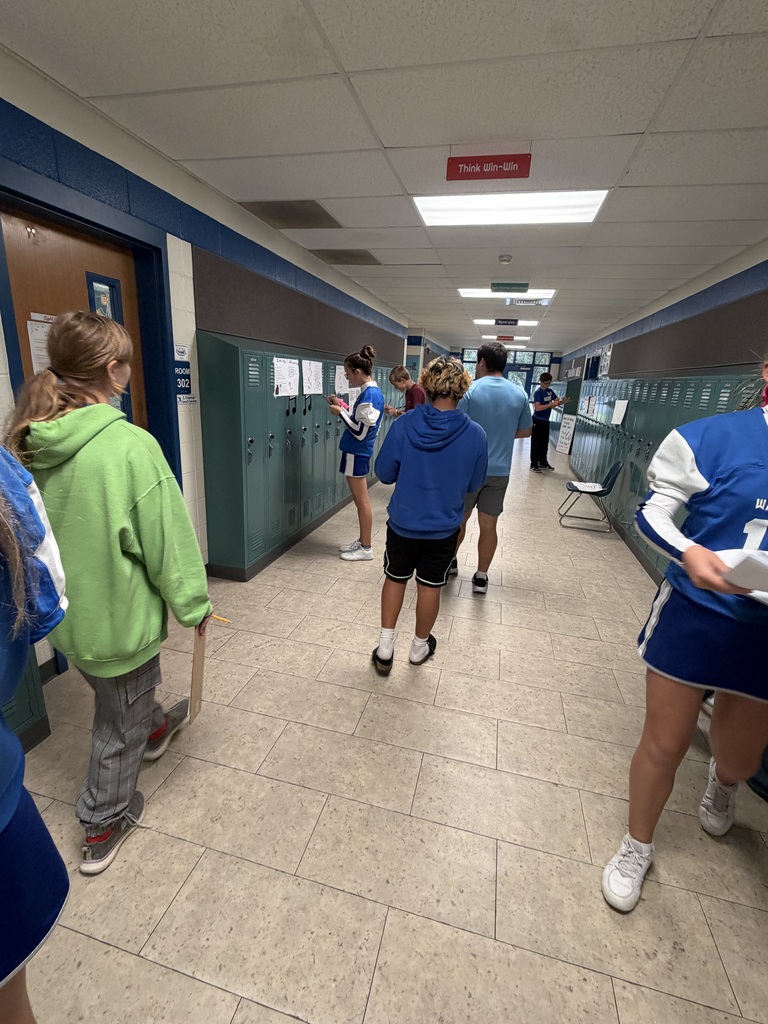 Mrs. Ehlers' 8th-grade ELA class participate in a Poetry Gallery Walk to showcase their creative writing skills. 