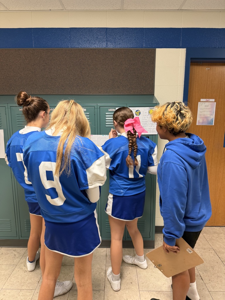 Mrs. Ehlers' 8th-grade ELA class participate in a Poetry Gallery Walk to showcase their creative writing skills. 