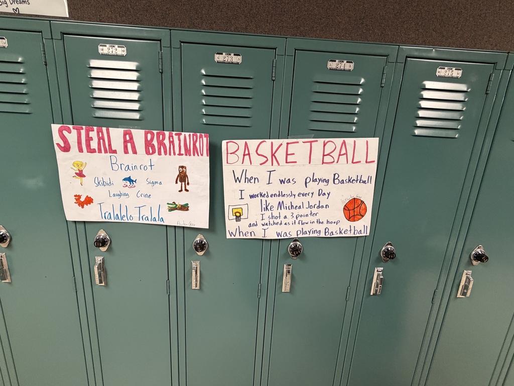 Mrs. Ehlers' 8th-grade ELA class participate in a Poetry Gallery Walk to showcase their creative writing skills. 