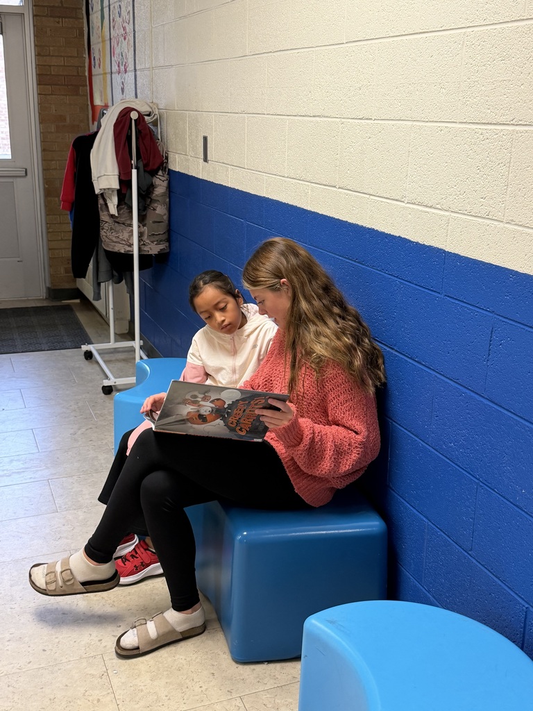 The 9th graders read to 4th graders as part of a program that was started last year.