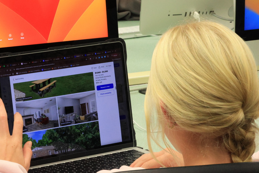 Students look up possible houses to purchase on Zillow in Mr. Lane's comupters class.
