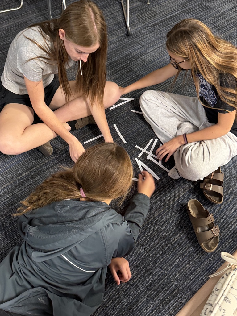 Mrs. Ehlers' 9th grade ELA class works together to match modern-day translations with Shakespeare’s original language. 
