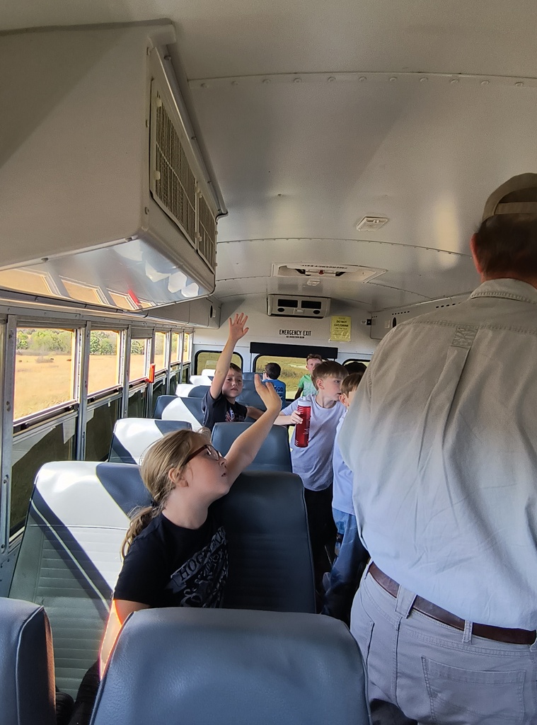 Mrs. Simnitt's 4th graders view bison in a bus during their Konza Prairie field trip