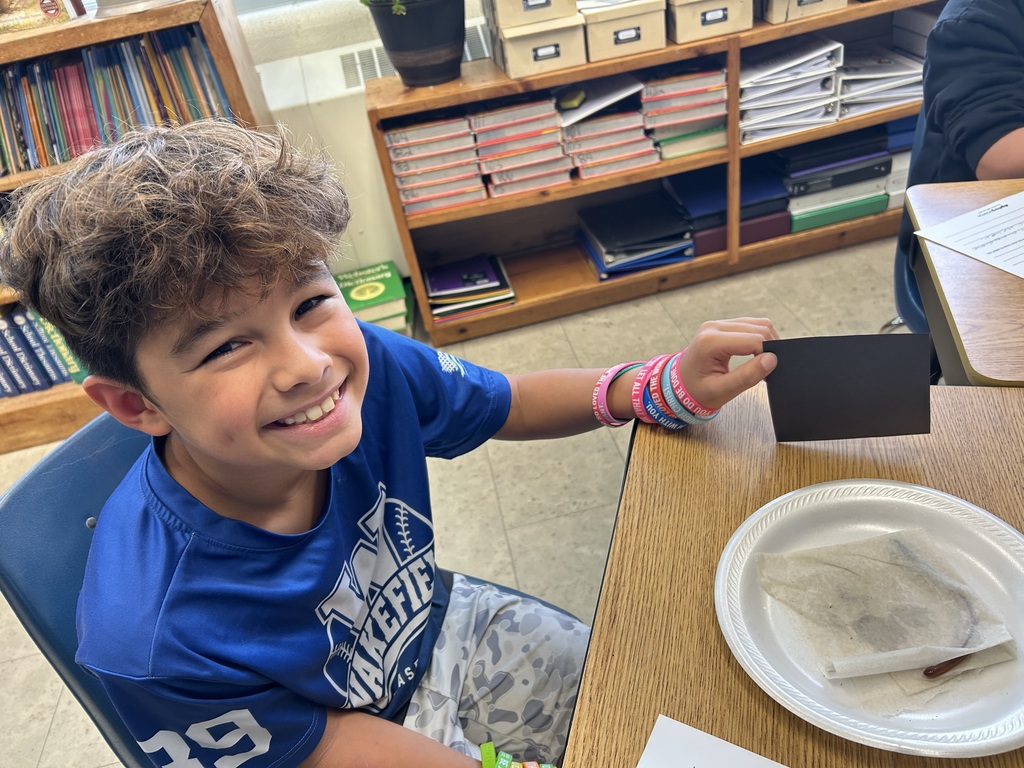 Mr. Yenni's science class studied worms with an experiment to prove whether they like wet, dark places. 