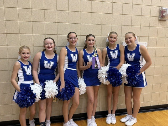 The Wakefield HS Jets cheerleading squad performs at the Sunflower Showdown compeition.