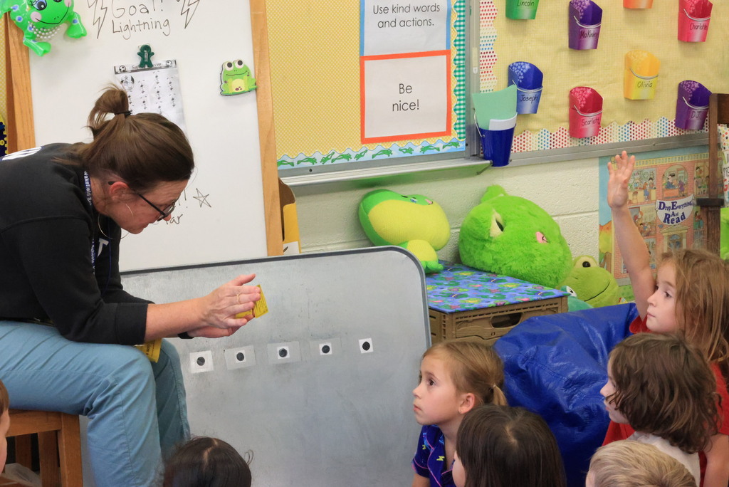K-12 counselor Janelle Rieger works with the K-1 students on the importance of safety during her regular counseling lesson.