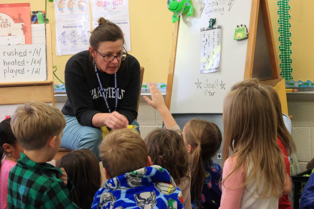 K-12 counselor Janelle Rieger works with the K-1 students on the importance of safety during her regular counseling lesson.