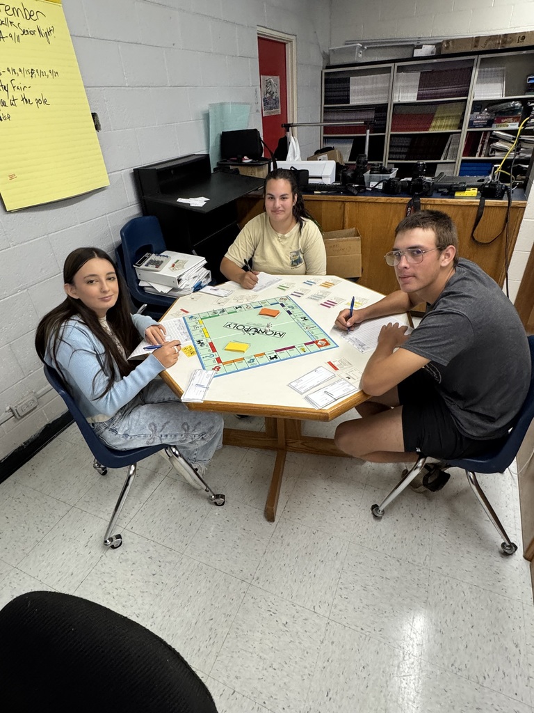 Math of Finance Students Writing Checks
