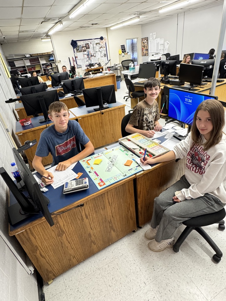 Math of Finance Students Writing Checks