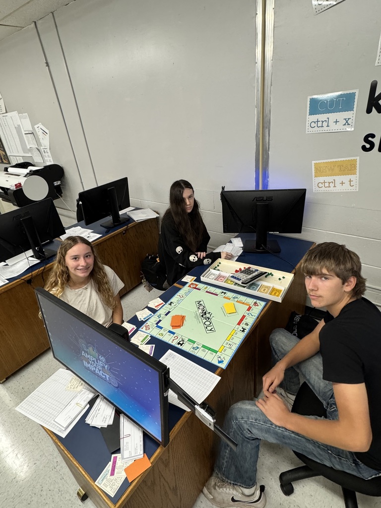 Math of Finance Students Writing Checks