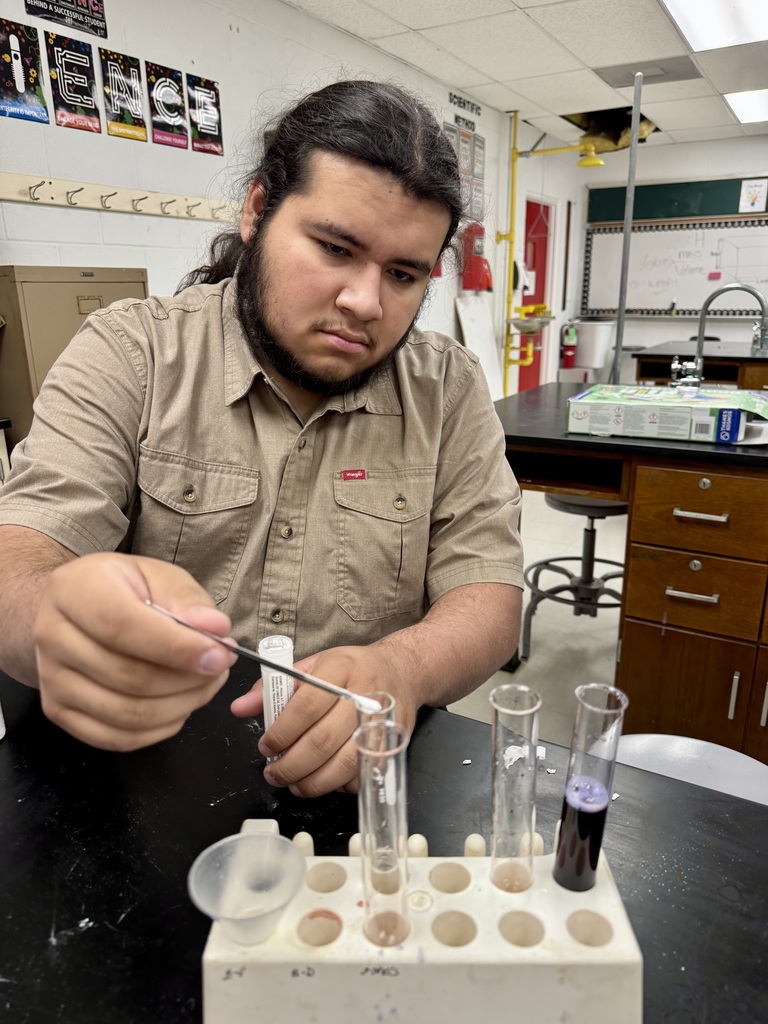 Picture of students performing a science lab