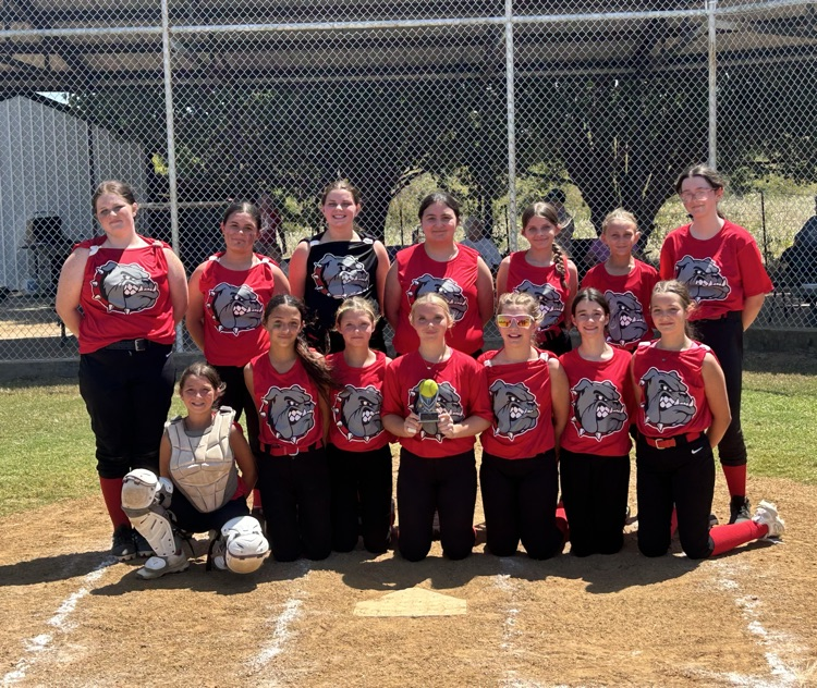 Softball team with plaque