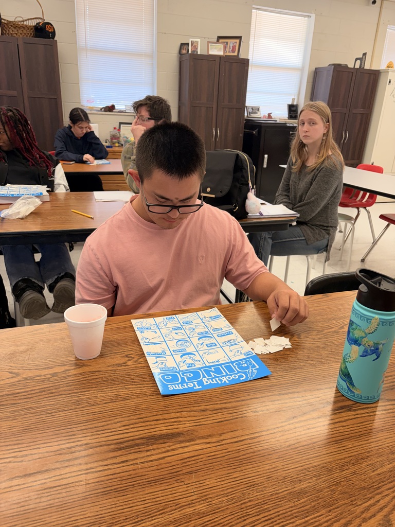 students in classroom playing a learning game