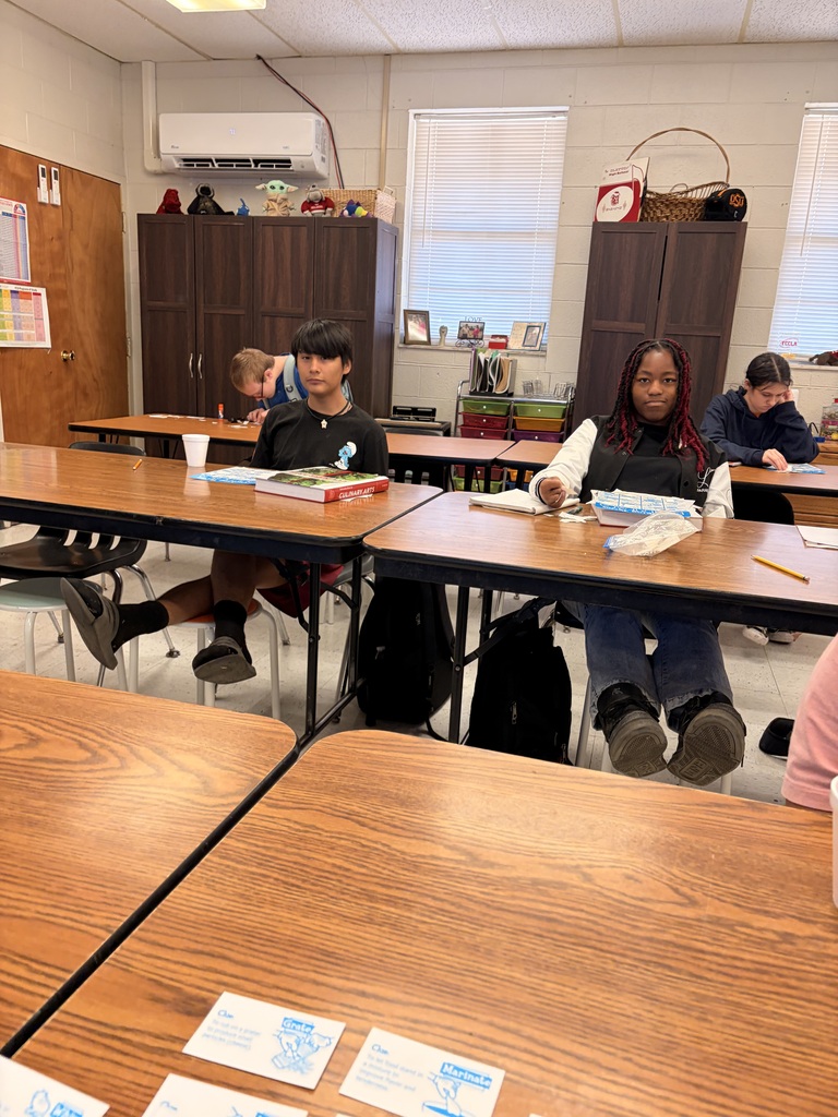 students in classroom playing a learning game