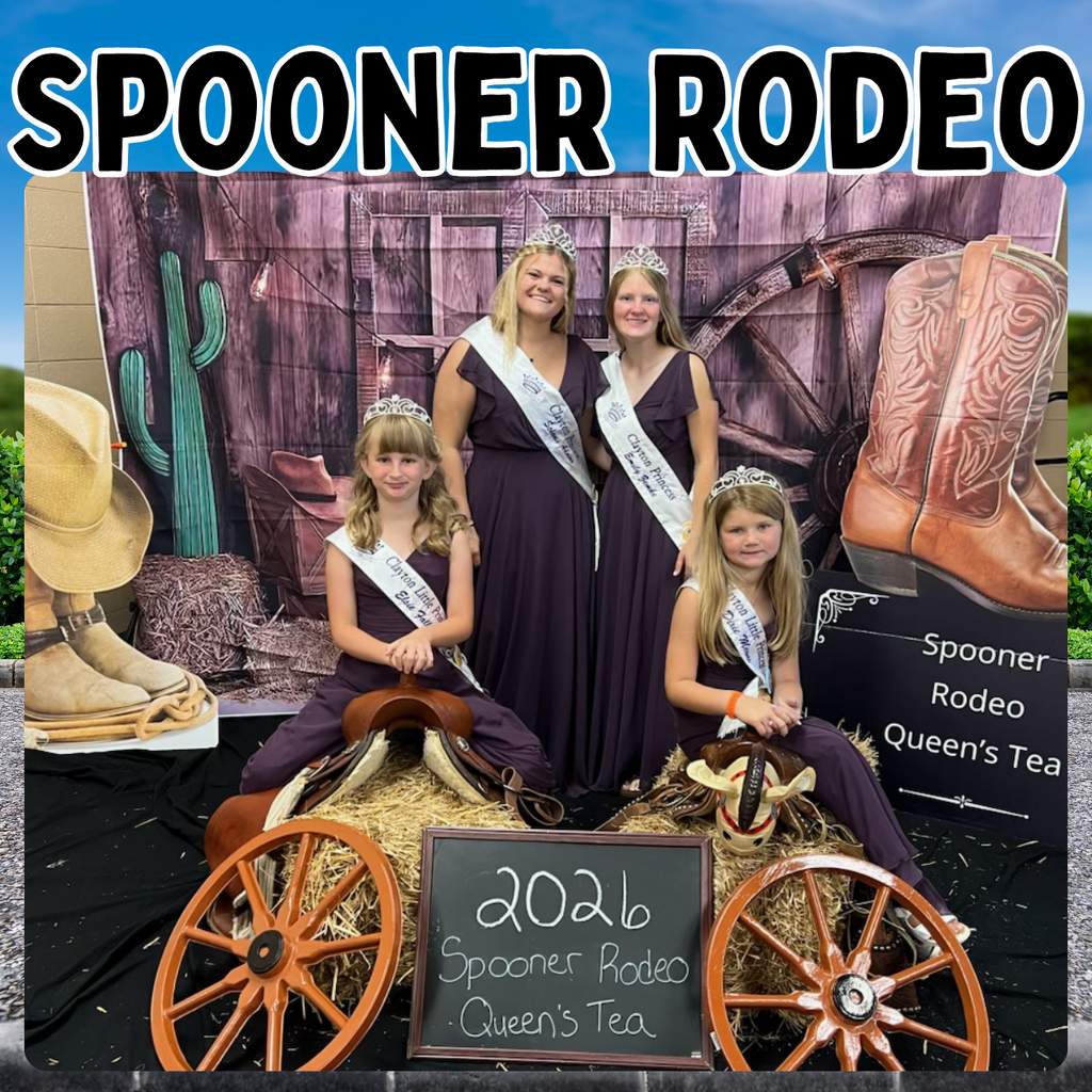 Image of the Clayton Royalty at the Spooner Rodeo posing in front of a backdrop that is western themed. 