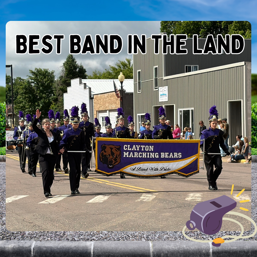 Image of the Clayton Marching Band marching down main street. The words best band in the land is above the picture.