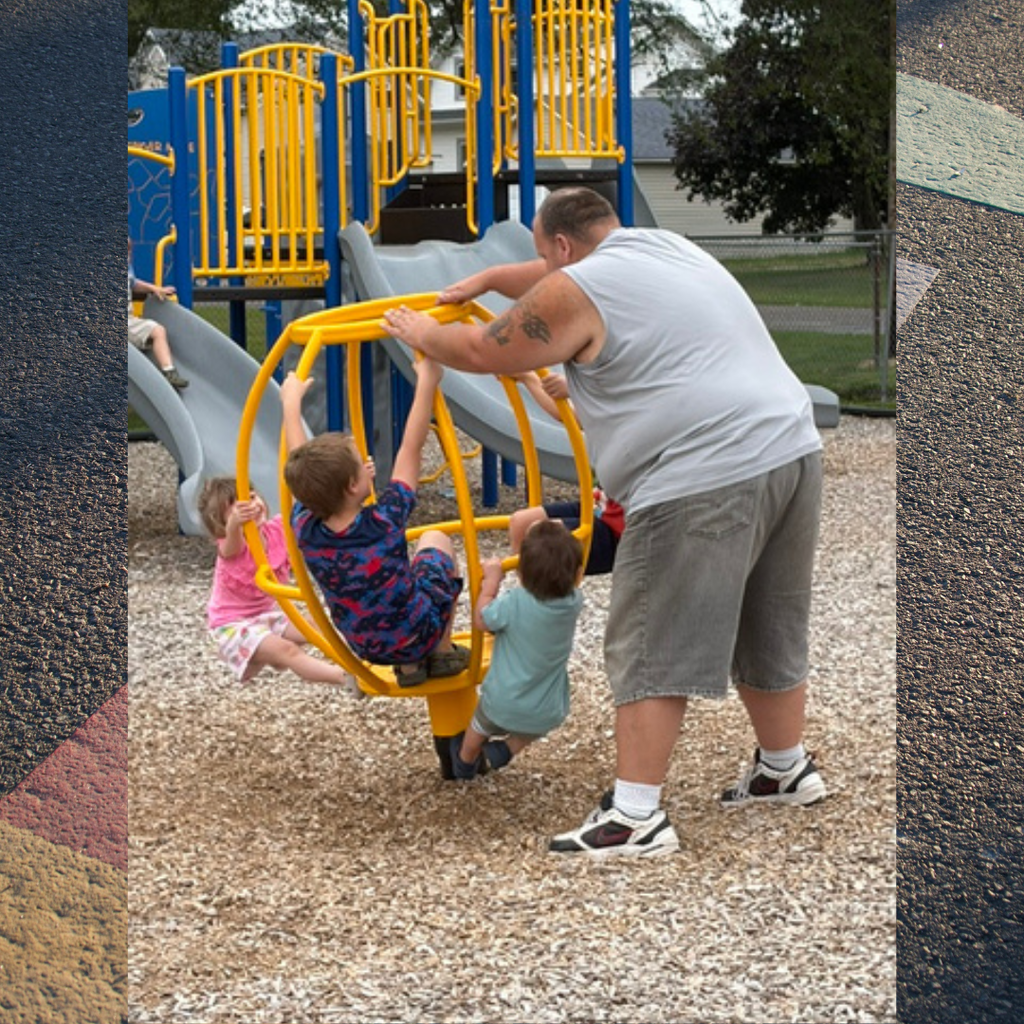 Kids playing on a playground. 