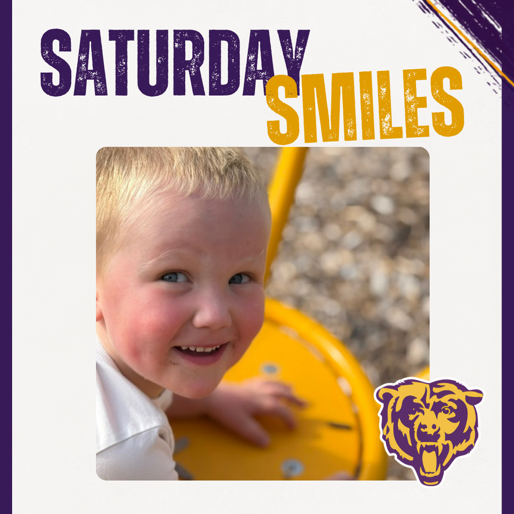 Saturday Smile Picturing a Child smiling on the playground.
