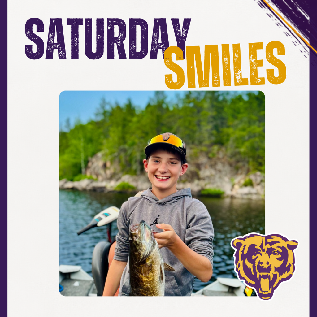 Saturday Smiles Post with a student holding a fish!