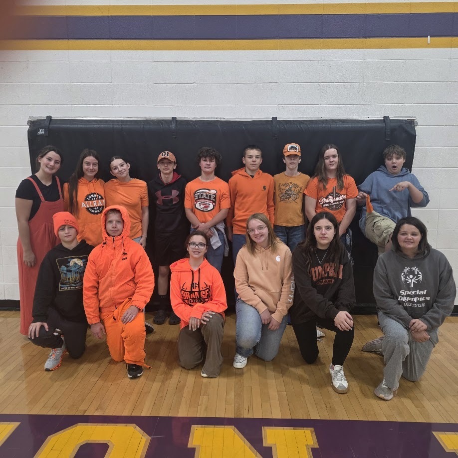 Color dress up day photos with students wearing colors matching their class.