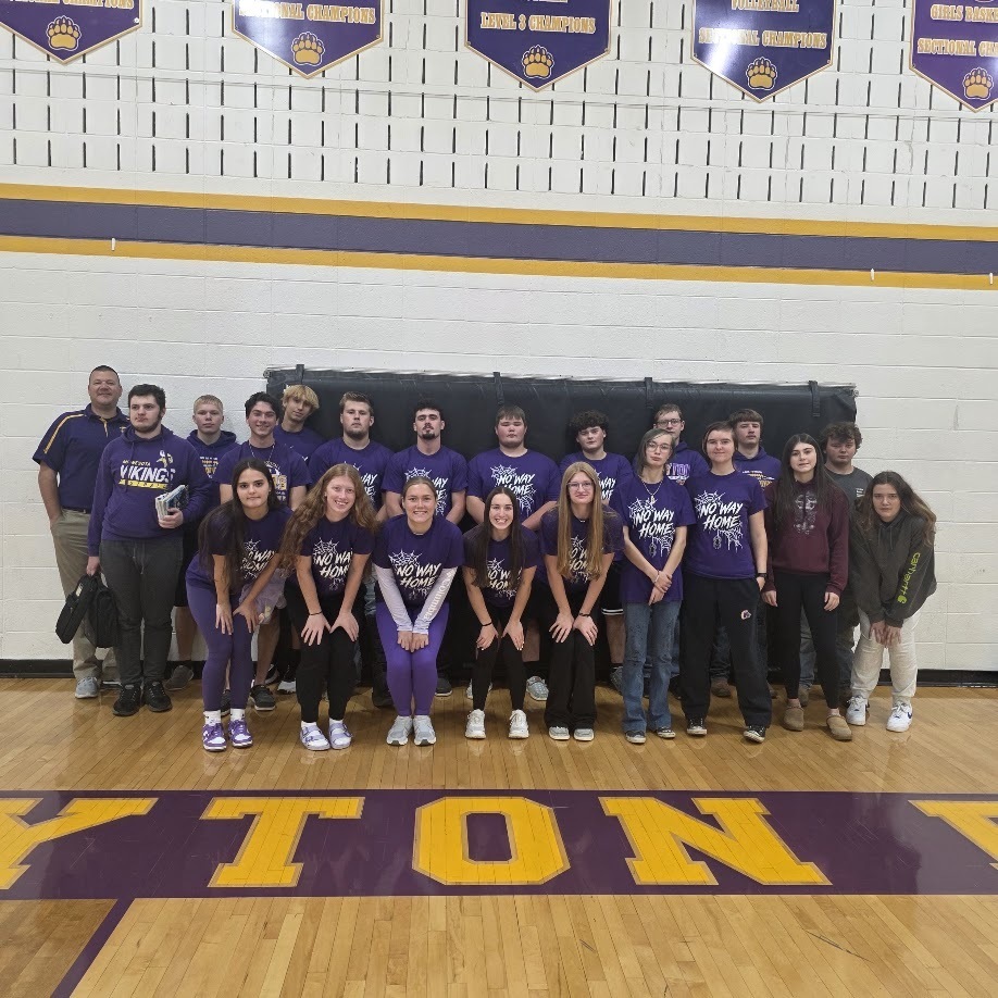 Color dress up day photos with students wearing colors matching their class.