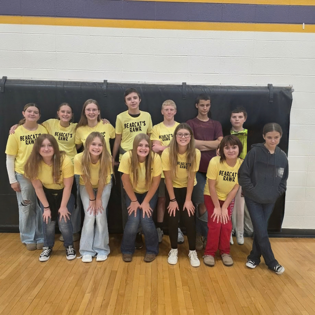 Color dress up day photos with students wearing colors matching their class.