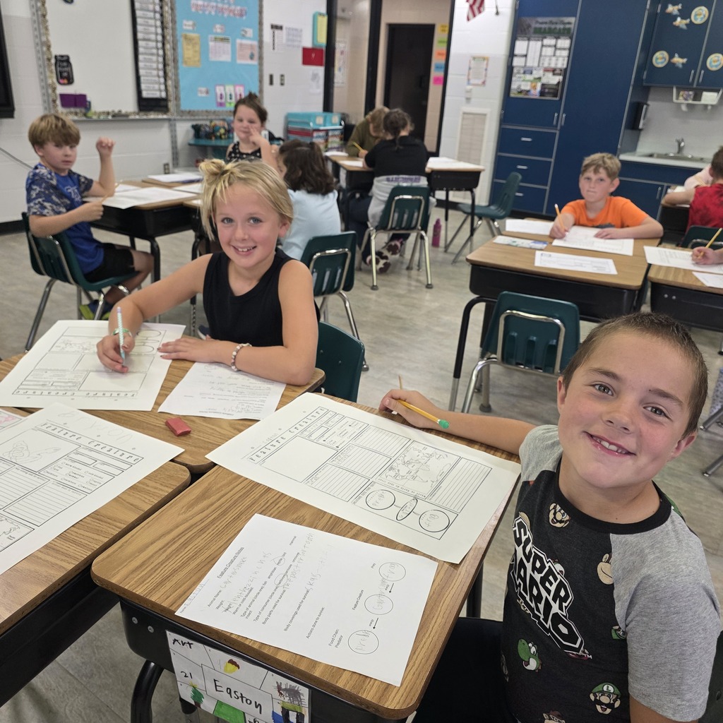 Students in the classroom learning about creatures
