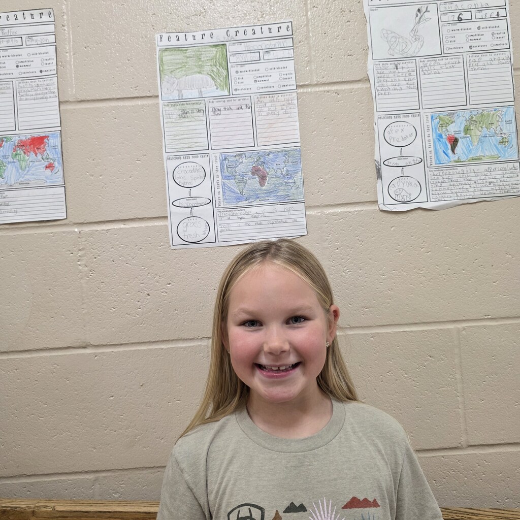 Students in the classroom learning about creatures