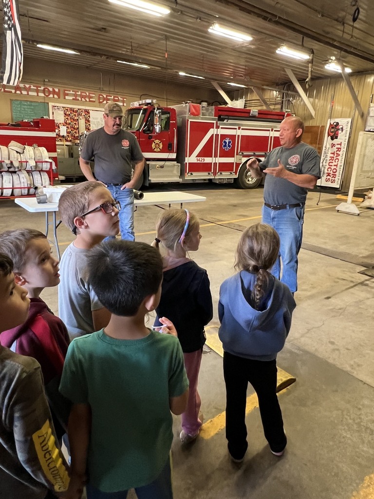 Fire Safety Week Photos showing students learning about fire safety