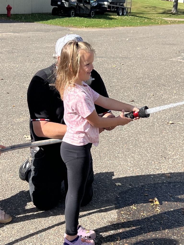 Fire Safety Week Photos showing students learning about fire safety