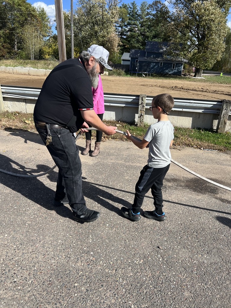 Fire Safety Week Photos showing students learning about fire safety