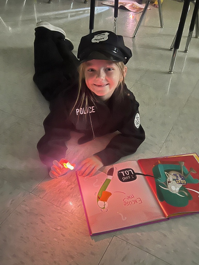 Children reading with finger lights