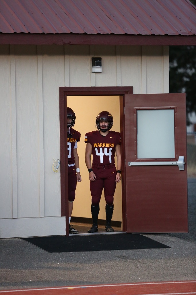 football players in field house