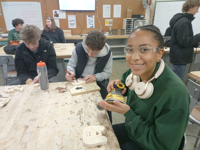 students working in woodshop