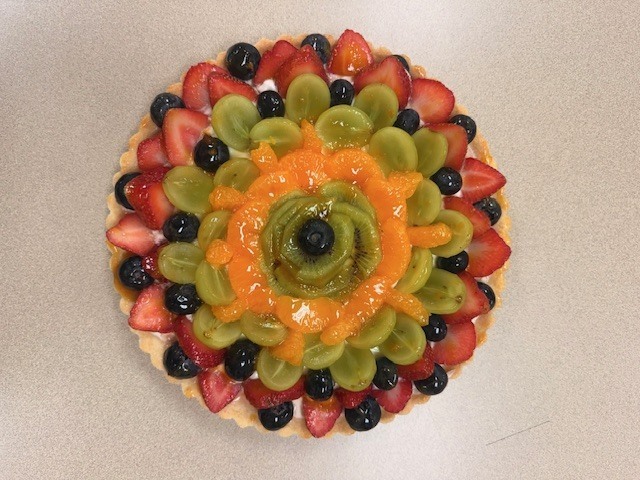 Picture of fruit tart made by students in Culinary Arts II classes taught by JD