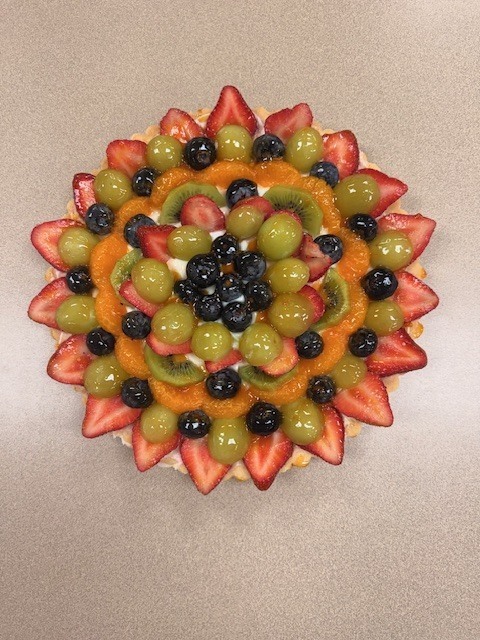 Picture of fruit tart made by students in Culinary Arts II classes taught by JD