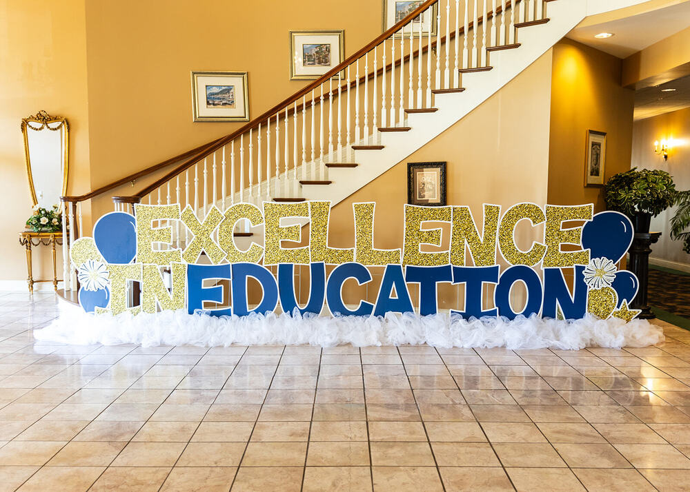 Excellence in Education sign.