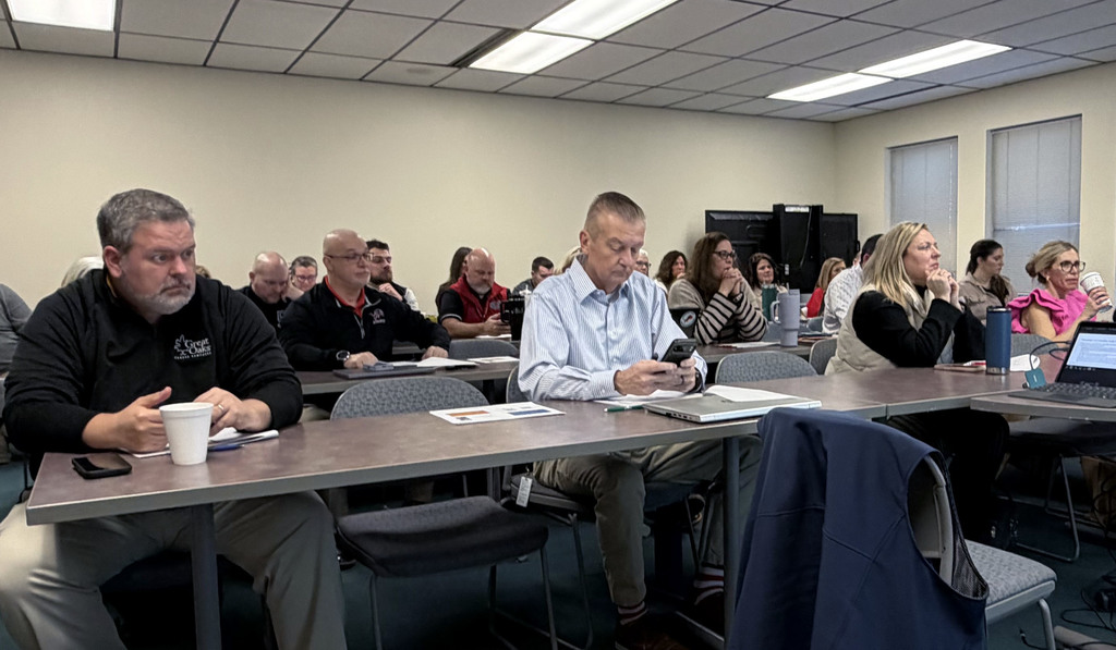 The 36 administrators from across the county listening to Judge Shriver address questions about the truancy laws.